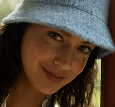 Kawai • bucket hat • blue sky